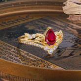 Nature-Inspired Pear-Cut Ruby Couple's Engagement Ring Set
